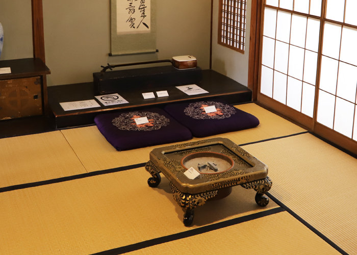 Images of the Replica charcoal brazier, cushions, shamisen